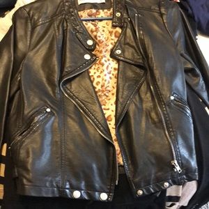 Black leather jacket with leopard print lining